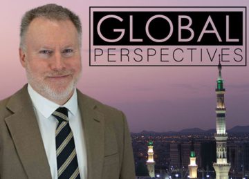 Dr. Wayne Bowen in front of a skyline in Saudi Arabia. Text: Global Perspectives.